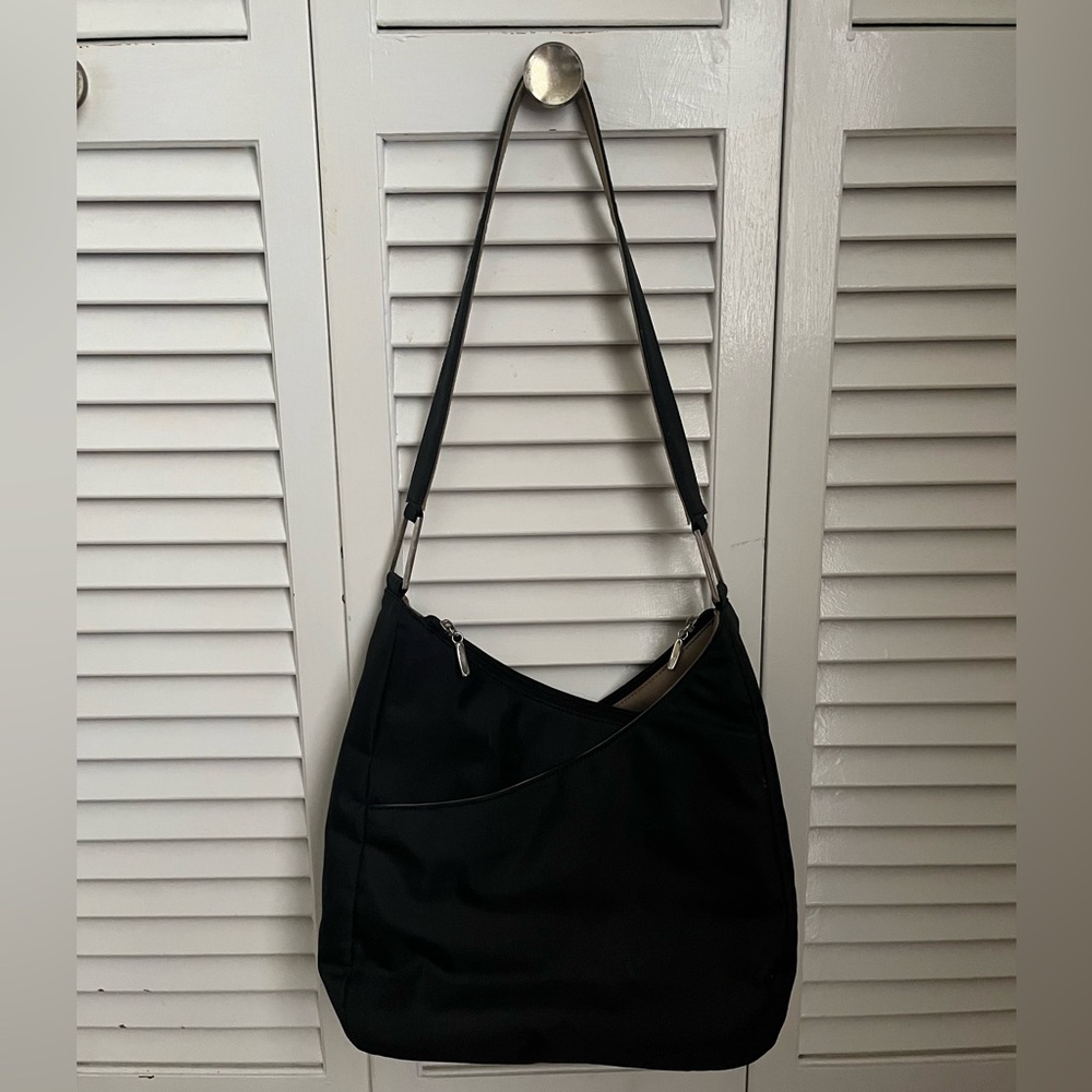 Great used black hobo-style purse w/ PLENTY of room to dump all your essentials.